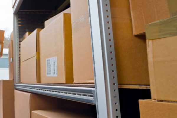 Cardboard boxes on a rack